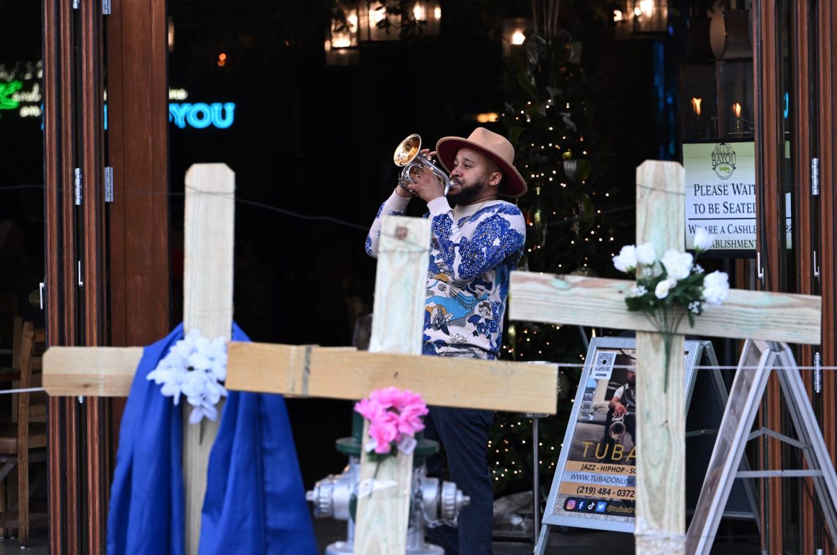 Crosses on Bourbon Street set up as a memorial for the people that were killed
Photo by Andrew Caballero/AFP/TNS