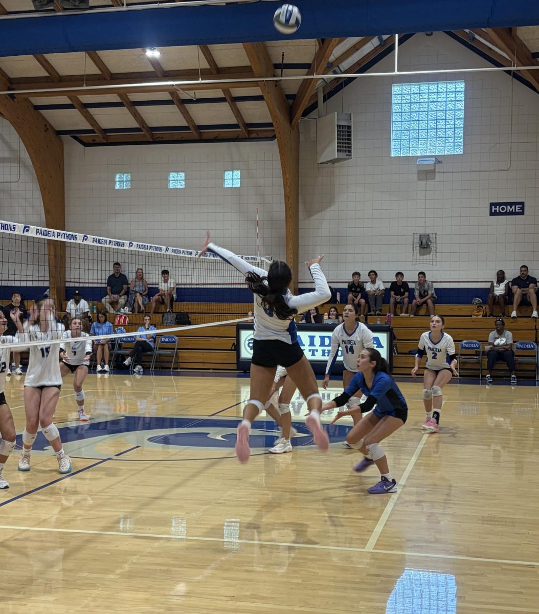 Isabel Samai ’29 leaps to hit the ball while playing against Mount Vernon.